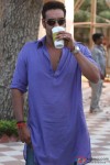Ajay Devgan taking a drink in Bol Bachchan Movie Stills