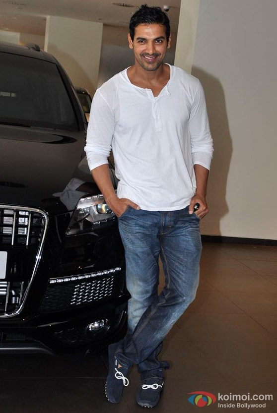 John Abraham with his car Audi Q7