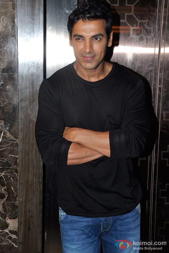 John Abraham sports a shy smile