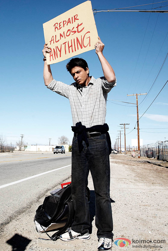 Shah Rukh Khan with a sign in My Name Is Khan Movie