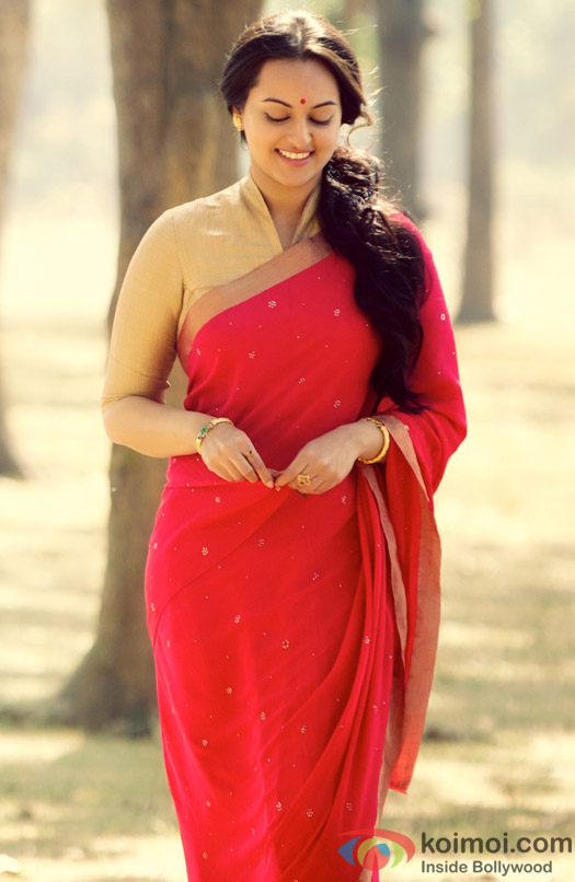 Sonakshi Sinha gleams in a bright red saree