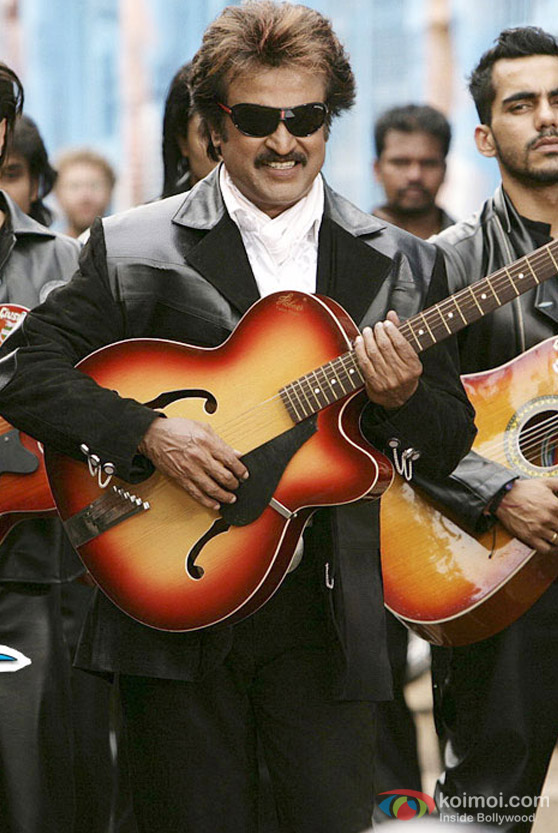 Rajnikanth strums the guitar in Sivaji - The Boss Movie