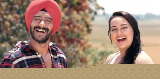 Sonakshi Sinha and Ajay Devgan sharing a smile in Son Of Sardar Movie Stills