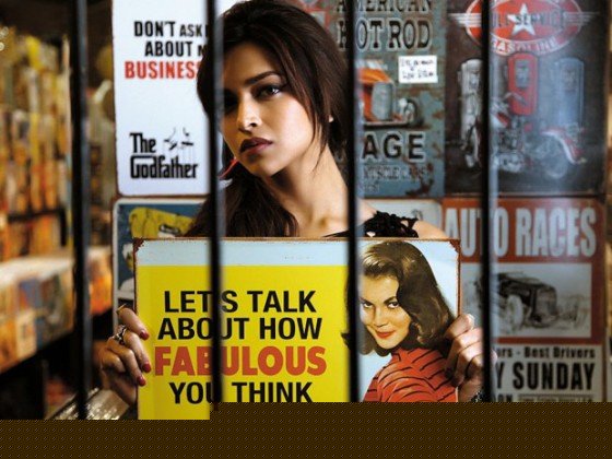 Deepika Padukone with board in Cocktail Movie Stills
