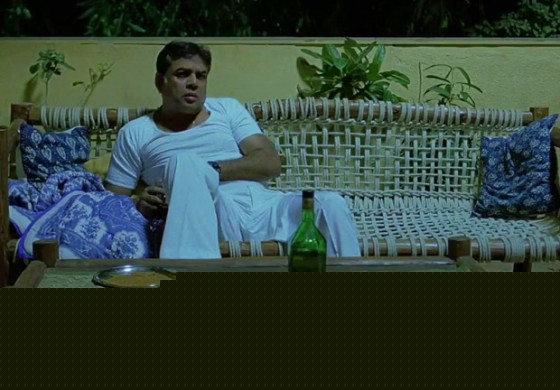 A drunk Paresh Rawal mourning his shops loss in OMG Oh My God Movie Stills