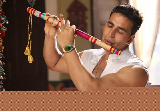 Akshay Kumar playing the flute in OMG Oh My God! Movie Stills
