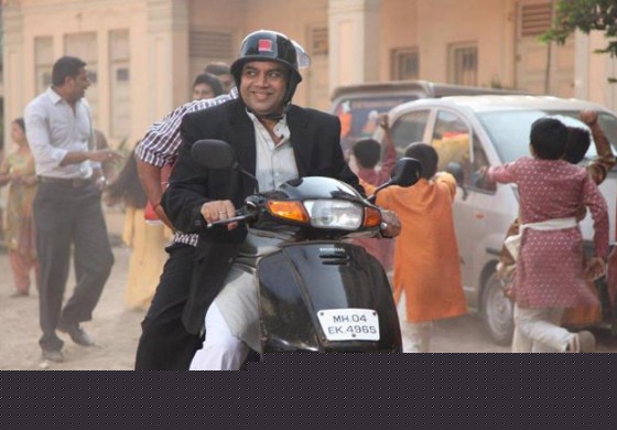 Paresh Rawal in the perfect businessman in OMG Oh My God Movie Stills