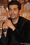 Karan Johar waits his turn to speak