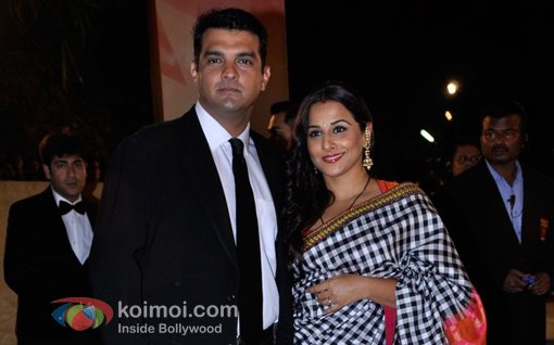 Vidya Balan and Siddharth Roy Kapur At Walk The Red Carpet Of Filmfare Awards 2013