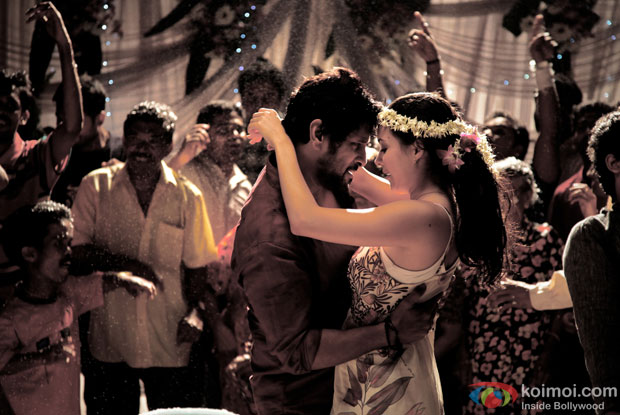 Chiyaan Vikram and Isha Sharvani in a still from David Movie