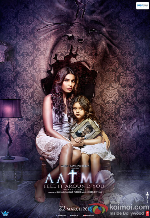 Bipasha Basu and Baby Doyel Dhawan in a Poster from Aatma Movie