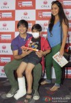 Vivek Oberoi and Priyanka Alva Oberoi attend a special screening of Krrish 3 organized for children diagnosed with Cancer Pic 2
