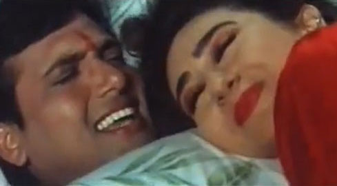 Govinda and Karisma Kapoor in a still from movie 'Raja Babu'