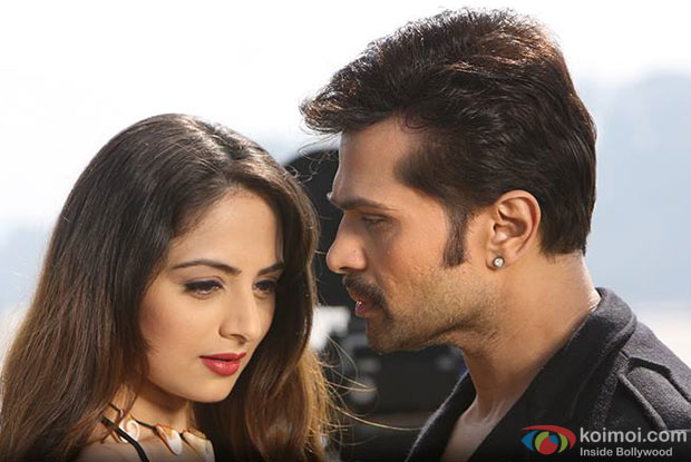 Zoya Afroz and Himesh Reshammiya in a still from movie 'The Xpose'