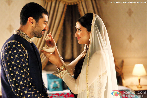 Aditya Roy Kapur and Parineeti Chopra in a still from movie 'Daawat-e-Ishq' Aditya Roy Kapur and Parineeti Chopra in a still from movie 'Daawat-e-Ishq'