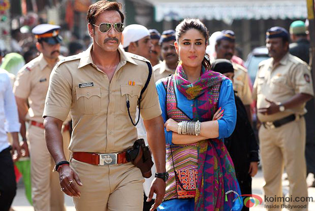 Ajay Devgn and Kareena Kapoor in a Still from movie 'Singham Returns' Ajay Devgn and Kareena Kapoor in a Still from movie 'Singham Returns'
