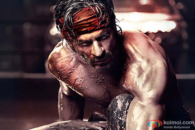 Shah Rukh Khan in a still from movie 'Happy New Year'