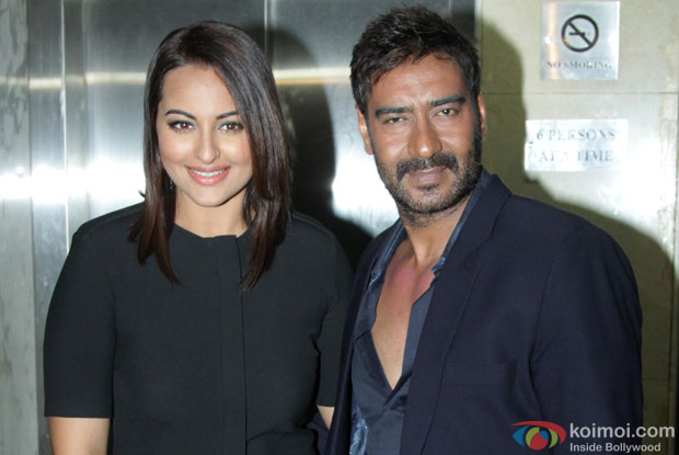 Sonakshi Sinha and Ajay Devgn at an event