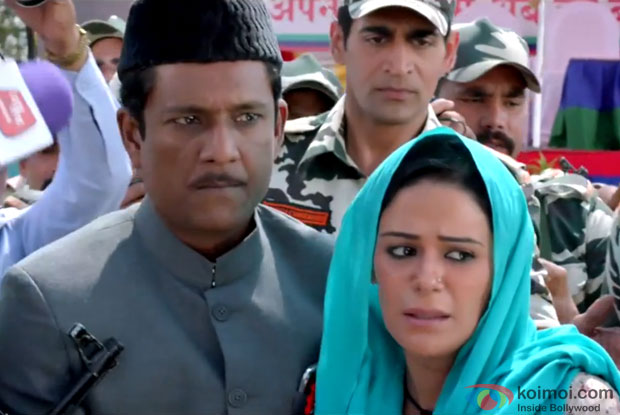 Adil Hussain and Mona Singh in a still from movie 'Zed Plus'