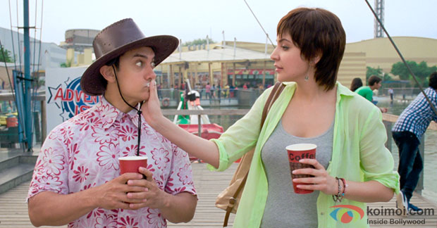 Aamir Khan and Anushka Sharma in a 'Love Is A Waste Of Time' song still from movie 'PK' Aamir Khan and Anushka Sharma in a 'Love Is A Waste Of Time' song still from movie 'PK'