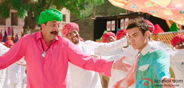 Sanjay Dutt and Aamir Khan in a 'Tharki Chokro' song still from movie 'PK'