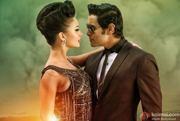 Amy Jackson and Chiyaan Vikram in a Still from movie 'I'