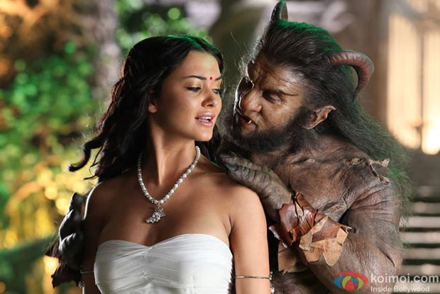 Amy Jackson and Chiyaan Vikram in a Still from movie 'I'