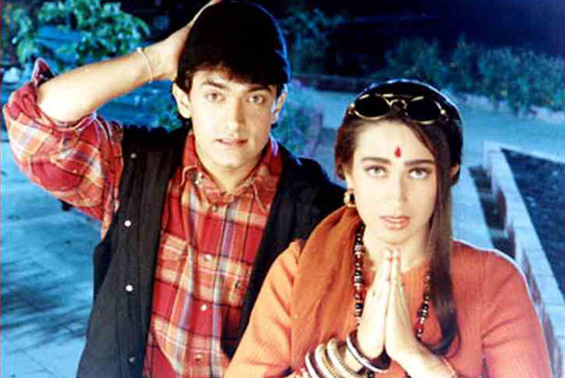 Aamir Khan and Karisma Kapoor in a still from movie 'Raja Hindustani (1996)'