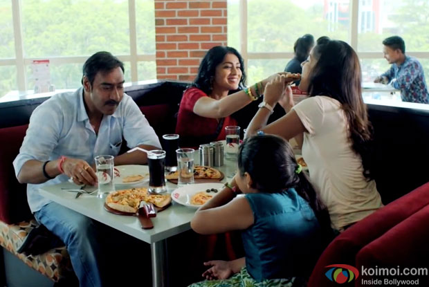 Ajay Devgn, Shriya Saran and  Ishita Dutta in a still from movie ‘Drishyam’