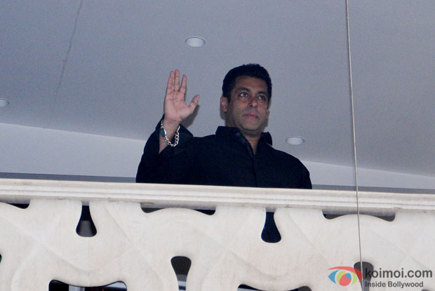 Salman Khan waves to his fans who came to greet him on occasion of Eid al-Fitr