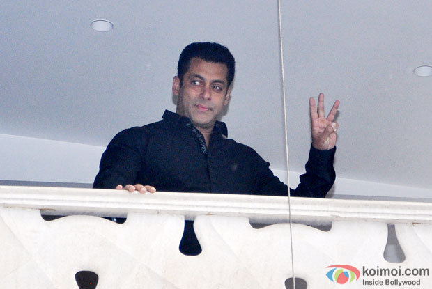 Salman Khan waves to his fans who came to greet him on occasion of Eid al-Fitr