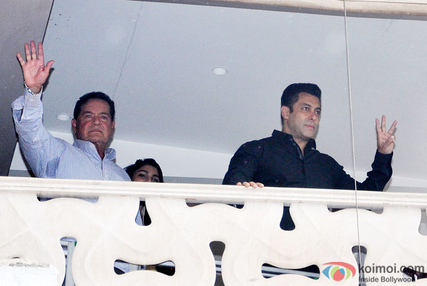 Salman Khan with father Salim Khan waves to his fans who came to greet him on occasion of Eid al-Fitr