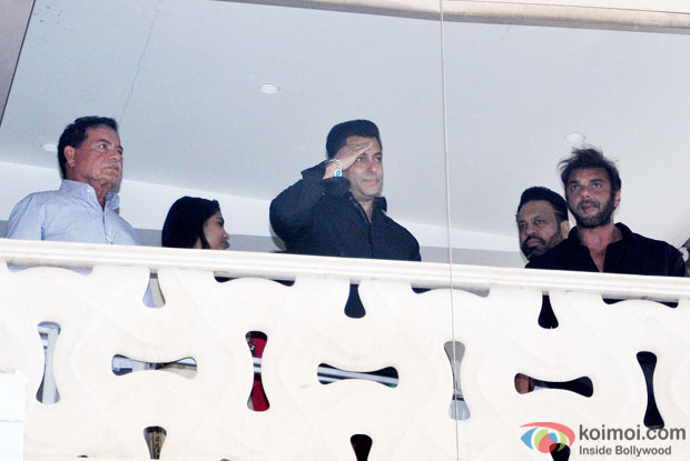 Salman Khan with his family members waves to his fans who came to greet him on occasion of Eid al-Fitr