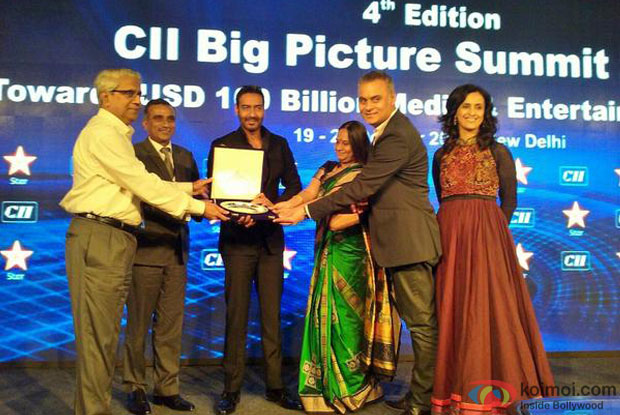 CII Awards Ajay Devgn with Award for Excellence in Indian Cinema