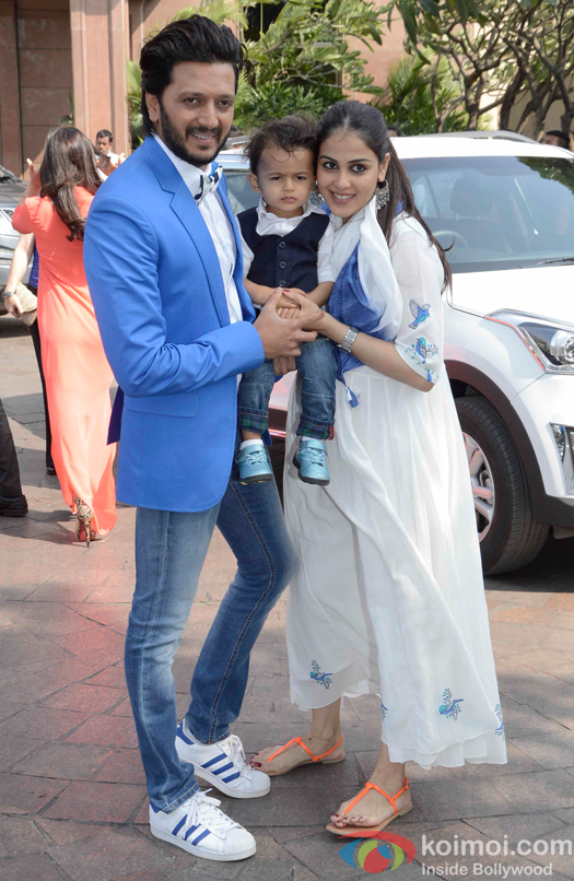  Riteish Deshmukh with his son Riaan and wife Genelia D'Souza during Arpita Khans baby shower ceremony
