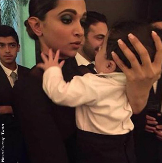 Deepika Padukone plays with Baby at her best friend's wedding