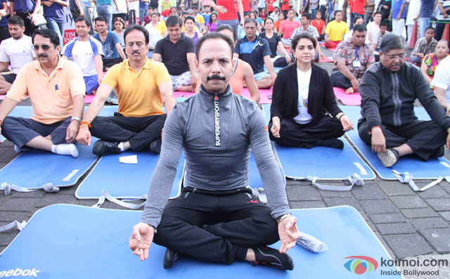 Mickey Mehta and Shaina NC during the International Yoga day