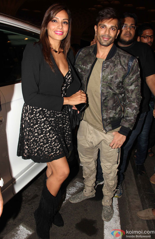 Bipasha Basu and Karan Singh Grover at airport leave for IIFA 2016