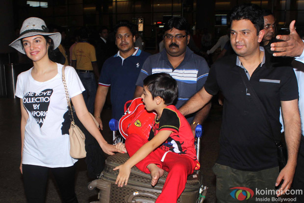 Bhushan Kumar, Divya Khosla Kumar and Son Ruhaan Kumar at International Airport