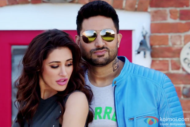 Nargis Fakhri and Abhishek Bachchan in a still from Housefull 3