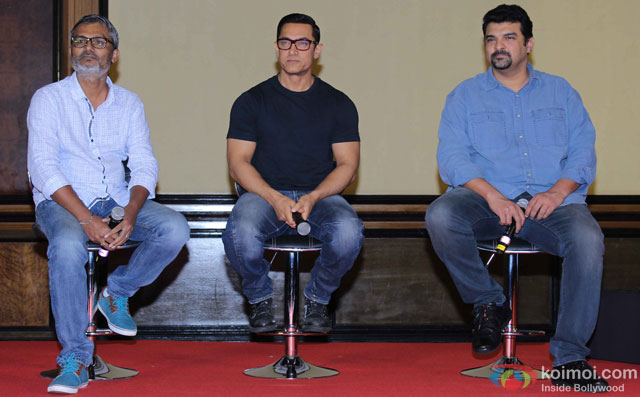 Nitesh Tiwari, Aamir Khan and Siddharth Roy Kapur during the poster launch of film 'Dangal'