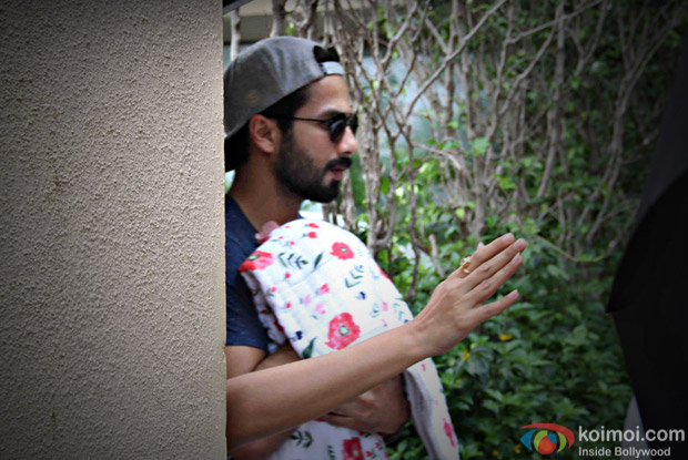 Shahid Kapoor with his baby girl