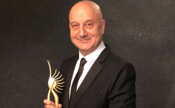 Anupam Kher dedicates award to struggling actors without godfathers