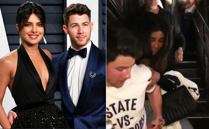 Priyanka trips, clasps Nick's arm, avoids fall