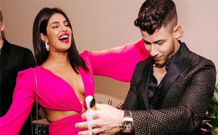 This is how much Priyanka's neon pink cutout gown costs