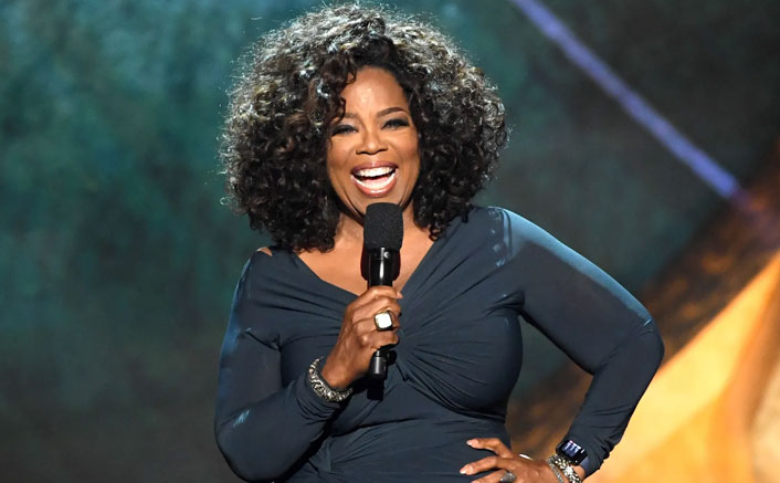 Oprah Winfrey falls on stage while talking about balance