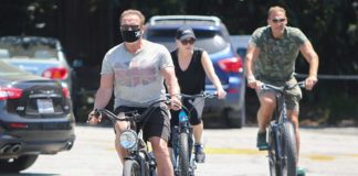 Arnold Schwarzenegger Enjoys Bike Ride With Girlfriend Heather Milligan
