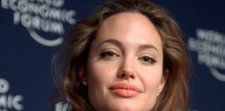 Angelina Jolie Looks A Breath Of Fresh Air In A Flowing Off-White Dress With A Matching Dior Bag!