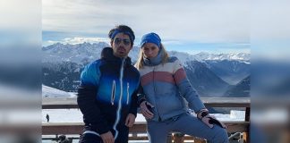 Sophie Turner Is A 'Vision In White' As She Cradles Her Baby Bump On A Stroll With Husband Joe Jonas