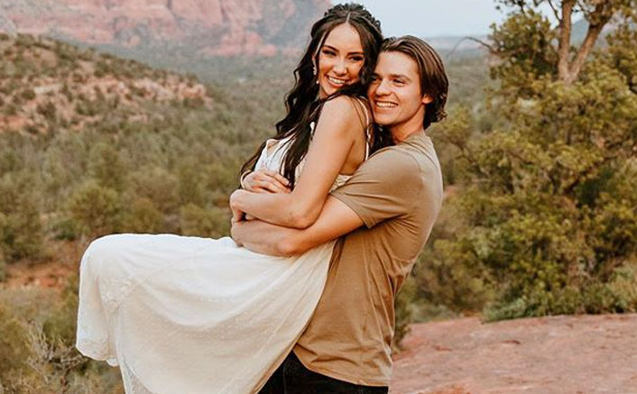 The Kissing Booth’s Joel Courtney AKA Lee Flynn Weds Mia Scholink & Their FIRST Pictures Are Straight Out Of A Fairytale